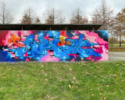 Coralle and Blue Stylewriting by Rowdy. This Graffiti is located in Leipzig, Germany and was created in 2023. This Graffiti can be described as Stylewriting, Wall of Fame and Characters.