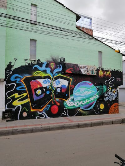 Colorful Streetart by Huk and Seb. This Graffiti is located in Suacha, Colombia and was created in 2021.