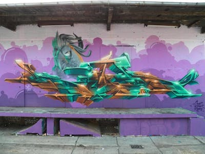 Colorful Stylewriting by Köter. This Graffiti is located in Magdeburg, Germany and was created in 2019. This Graffiti can be described as Stylewriting, Futuristic, Characters and Wall of Fame.