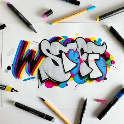 Chrome and Colorful Blackbook by ERGH. This Graffiti is located in Newcastle, United Kingdom and was created in 2022. This Graffiti can be described as Blackbook.