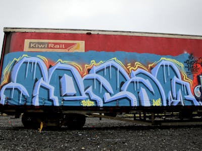 Light Blue and Cyan Stylewriting by Kezam. This Graffiti is located in Auckland, New Zealand and was created in 2024. This Graffiti can be described as Stylewriting, Trains, Freights and 3D.