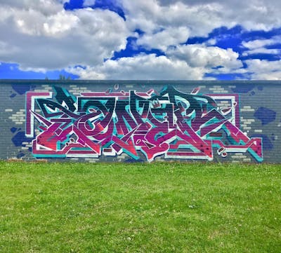 Violet and Colorful Stylewriting by Toner2 and OTZ. This Graffiti is located in Belgium and was created in 2020.