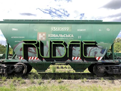 Black and Green Trains by Rubae LEGZ, MBK and UC. This Graffiti is located in Kyiv, Ukraine and was created in 2019. This Graffiti can be described as Trains, Handstyles and Freights.