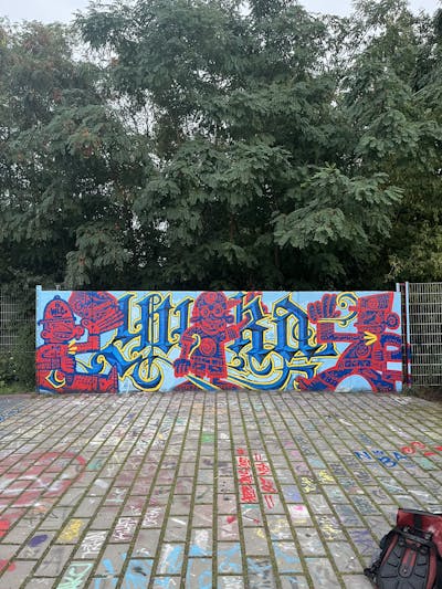 Red and Blue Stylewriting by Hülpman, OST, PÜTK, Yuka and NBA. This Graffiti is located in Berlin, Germany and was created in 2023. This Graffiti can be described as Stylewriting, Wall of Fame and Characters.