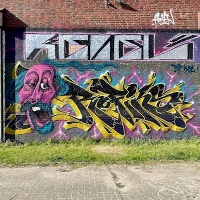 Yellow and Black Stylewriting by MicRoFiks, Fiks and Rofiks. This Graffiti is located in Germany and was created in 2022. This Graffiti can be described as Stylewriting, Wall of Fame and Characters.