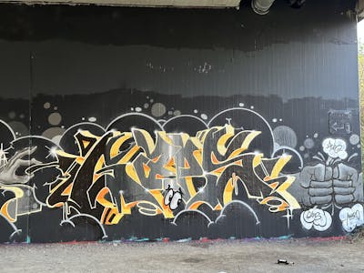 Grey and Black and Orange Stylewriting by Gaps. This Graffiti is located in Leipzig, Germany and was created in 2023. This Graffiti can be described as Stylewriting and Characters.