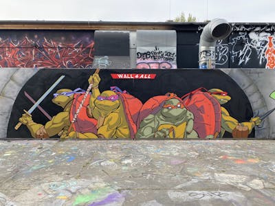 Red and Light Green Characters by Alien. This Graffiti is located in Potsdam, Germany and was created in 2022. This Graffiti can be described as Characters and Wall of Fame.
