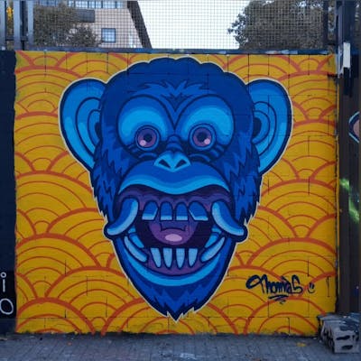 Blue and Yellow Characters by Thomas. This Graffiti is located in Barcelona, Spain and was created in 2022.
