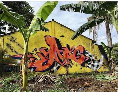 Orange and Yellow Stylewriting by Hmas. This Graffiti is located in Lombok, Indonesia and was created in 2020.