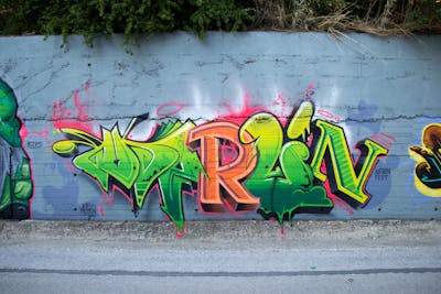 Light Green and Orange Stylewriting by Merlin. This Graffiti is located in Polikastro, Greece and was created in 2022. This Graffiti can be described as Stylewriting and Wall of Fame.