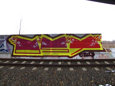 Red and Yellow Stylewriting by urine, Pizar and OST. This Graffiti is located in Leipzig, Germany and was created in 2013. This Graffiti can be described as Stylewriting, Street Bombing and Line Bombing.