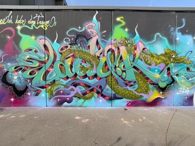 Colorful and Cyan Stylewriting by Lady.K and 156. This Graffiti is located in Berlin, Germany and was created in 2019. This Graffiti can be described as Stylewriting, Characters and Wall of Fame.