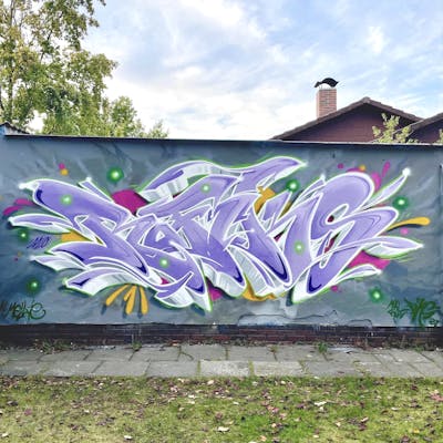 Colorful Wall of Fame by MicRoFiks and Fiks. This Graffiti is located in Oldenburg, Germany and was created in 2022. This Graffiti can be described as Wall of Fame and Stylewriting.