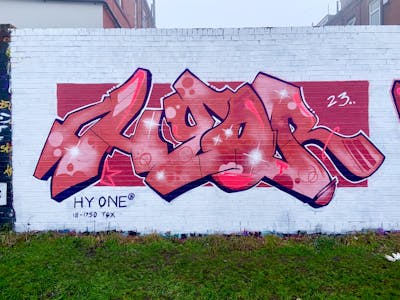 Red and Coralle and Blue Stylewriting by Hyro. This Graffiti is located in Leeds, United Kingdom and was created in 2023. This Graffiti can be described as Stylewriting and Wall of Fame.