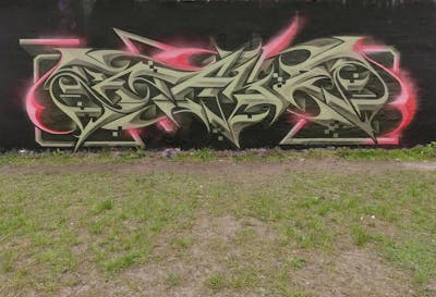 Green Stylewriting by Rays. This Graffiti is located in Potsdam, Germany and was created in 2021. This Graffiti can be described as Stylewriting, Special and Wall of Fame.