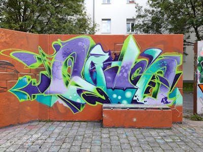Violet and Cyan and Light Green Stylewriting by Sewo43. This Graffiti is located in Germany and was created in 2022. This Graffiti can be described as Stylewriting and Wall of Fame.
