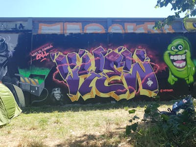 Colorful Stylewriting by Vyew and LFP. This Graffiti is located in Toulouse, France and was created in 2021. This Graffiti can be described as Stylewriting, Characters and Wall of Fame.