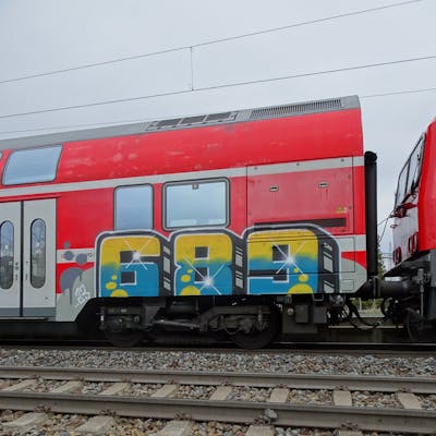 Yellow and Light Blue Stylewriting by 689 and 689ers. This Graffiti is located in Germany and was created in 2023. This Graffiti can be described as Stylewriting and Trains.