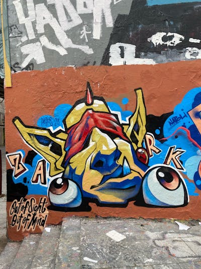 Colorful Characters by Zark. This Graffiti is located in Paris, France and was created in 2024. This Graffiti can be described as Characters and Wall of Fame.