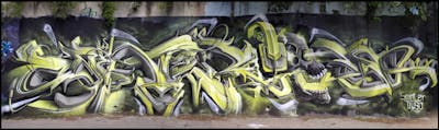 Grey and Light Green Stylewriting by Sainter and Duso. This Graffiti is located in Bratislava, Slovakia and was created in 2021. This Graffiti can be described as Stylewriting, Characters and Wall of Fame.
