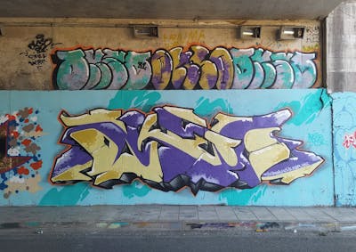 Colorful Stylewriting by SparkTwo and LFT. This Graffiti is located in Agrinio, Greece and was created in 2022. This Graffiti can be described as Stylewriting and Wall of Fame.