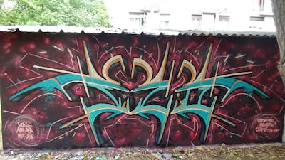 Cyan and Colorful Stylewriting by Fuzio. This Graffiti is located in Szolnok, Hungary and was created in 2022.
