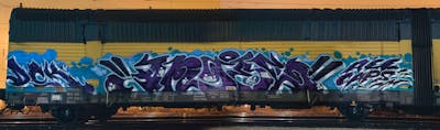 Violet and Light Blue Stylewriting by DCK, Angel and ALL CAPS COLLECTIVE. This Graffiti is located in Hungary and was created in 2020. This Graffiti can be described as Stylewriting, Trains and Freights.