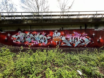 Red and Grey Stylewriting by ZICK, REKONE, PMZ CREW and OHB. This Graffiti is located in Oldenburg, Germany and was created in 2024.