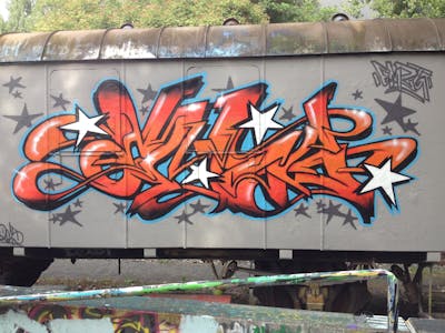 Orange Stylewriting by EmzG. This Graffiti is located in Zug, Switzerland and was created in 2022. This Graffiti can be described as Stylewriting and Wall of Fame.