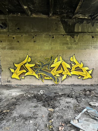 Yellow and Grey Stylewriting by News. This Graffiti is located in Walbrzych, Poland and was created in 2023. This Graffiti can be described as Stylewriting and Abandoned.