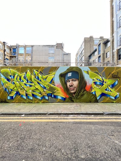 Light Green and Blue Stylewriting by Techno and Wosk. This Graffiti is located in London, United Kingdom and was created in 2022. This Graffiti can be described as Stylewriting, Characters and Wall of Fame.