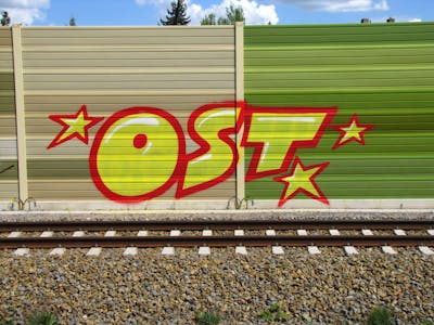 Red and Yellow Stylewriting by urine, Pizar and OST. This Graffiti is located in Leipzig, Germany and was created in 2016. This Graffiti can be described as Stylewriting and Line Bombing.