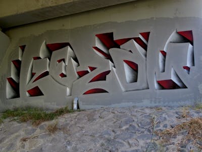Grey and Red Stylewriting by Kezam. This Graffiti is located in Melbourne, Australia and was created in 2023. This Graffiti can be described as Stylewriting, 3D and Wall of Fame.