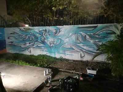 Cyan and Grey Stylewriting by Dest Jones. This Graffiti is located in Miami, United States and was created in 2018. This Graffiti can be described as Stylewriting and Characters.