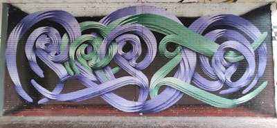 Cyan and Violet Stylewriting by Repto and ILRCrew. This Graffiti is located in Milano, Italy and was created in 2021. This Graffiti can be described as Stylewriting, 3D and Abandoned.