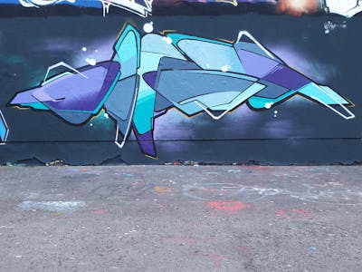 Grey and Violet and Cyan Stylewriting by Dirt. This Graffiti is located in Leipzig, Germany and was created in 2022. This Graffiti can be described as Stylewriting and Wall of Fame.