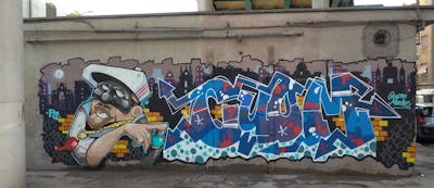 Colorful and Blue Stylewriting by Mache and Cuomo. This Graffiti is located in Naples, Italy and was created in 2022. This Graffiti can be described as Stylewriting and Characters.