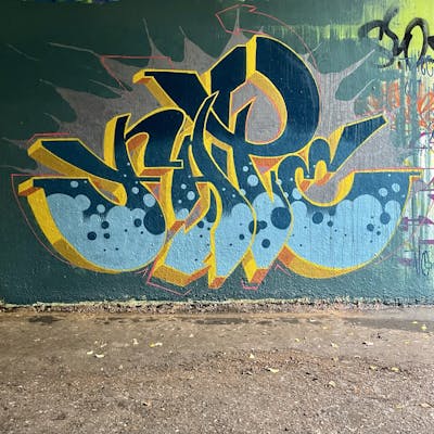 Cyan and Light Blue and Yellow Stylewriting by Fate.01. This Graffiti is located in London, United Kingdom and was created in 2022. This Graffiti can be described as Stylewriting and Wall of Fame.