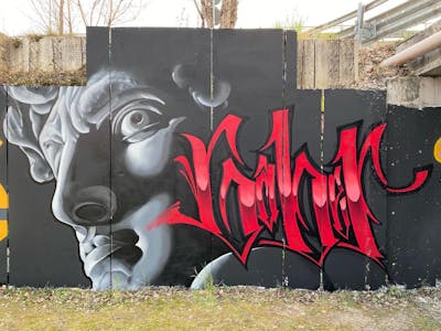 Grey and Red Characters by Yellow Fat Crew and Gaber. This Graffiti is located in Brescia, Italy and was created in 2021. This Graffiti can be described as Characters and Stylewriting.