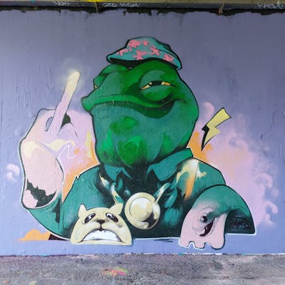 Light Green and Colorful Characters by Simian switch. This Graffiti is located in Dordrecht, Netherlands and was created in 2022. This Graffiti can be described as Characters and Wall of Fame.