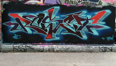 Cyan and Red Stylewriting by Reset. This Graffiti is located in Hannover, Germany and was created in 2022. This Graffiti can be described as Stylewriting and Wall of Fame.