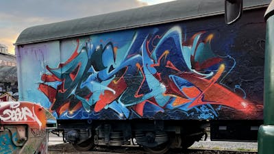Red and Blue Stylewriting by Desur and New Cru. This Graffiti is located in Hamburg, Germany and was created in 2022. This Graffiti can be described as Stylewriting, Wall of Fame, Trains and Freights.