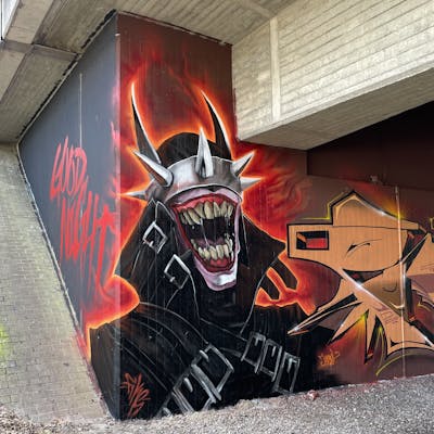Colorful and Red and Black Characters by Fiks and MicRoFiks. This Graffiti is located in Oldenburg, Germany and was created in 2023. This Graffiti can be described as Characters and Wall of Fame.