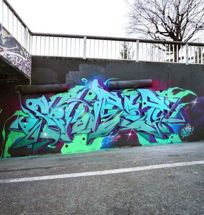 Cyan and Light Green Stylewriting by Crazy Mister Sketch. This Graffiti is located in Innsbruck, Austria and was created in 2022. This Graffiti can be described as Stylewriting and Wall of Fame.
