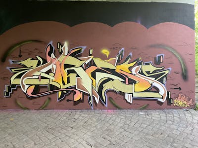 Beige and Brown and Orange Stylewriting by ORES24. This Graffiti is located in HALLE, Germany and was created in 2023. This Graffiti can be described as Stylewriting and Wall of Fame.