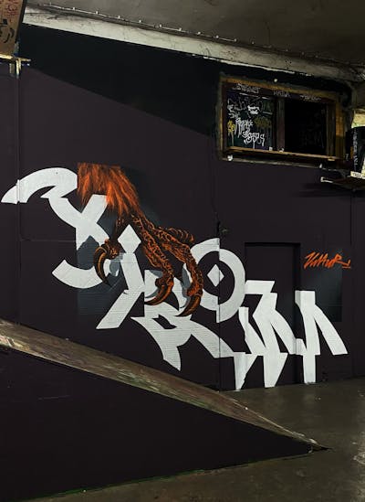 White and Orange Stylewriting by Sirom. This Graffiti is located in Germany and was created in 2023. This Graffiti can be described as Stylewriting and Characters.
