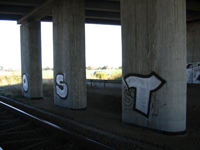 Chrome and Black Stylewriting by urine and OST. This Graffiti is located in Brehna, Germany and was created in 2006. This Graffiti can be described as Stylewriting and Line Bombing.