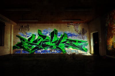 Light Green and Black Stylewriting by Syck, ABS, KKP and Los Capitanos. This Graffiti is located in Germany and was created in 2015. This Graffiti can be described as Stylewriting and Abandoned.
