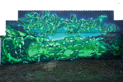 Green and Light Green and Cyan Stylewriting by Jason, Jason one and Juks. This Graffiti is located in Lüneburg, Germany and was created in 2023. This Graffiti can be described as Stylewriting, Characters and Murals.