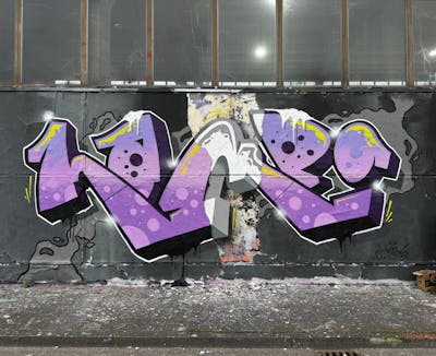 Violet and Grey Stylewriting by HAMPI. This Graffiti is located in MÜNSTER, Germany and was created in 2024. This Graffiti can be described as Stylewriting and Abandoned.